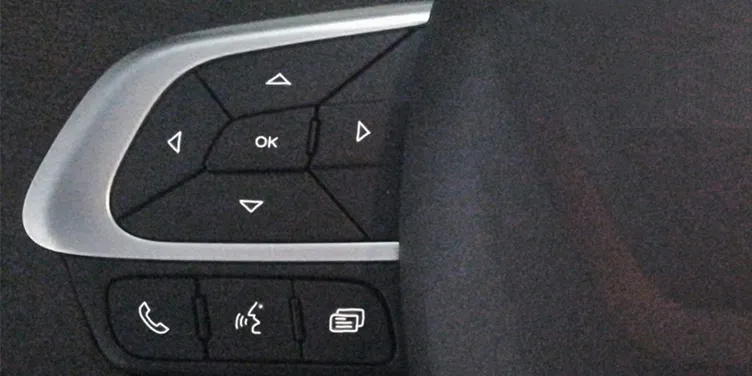 Steering wheel remote buttons